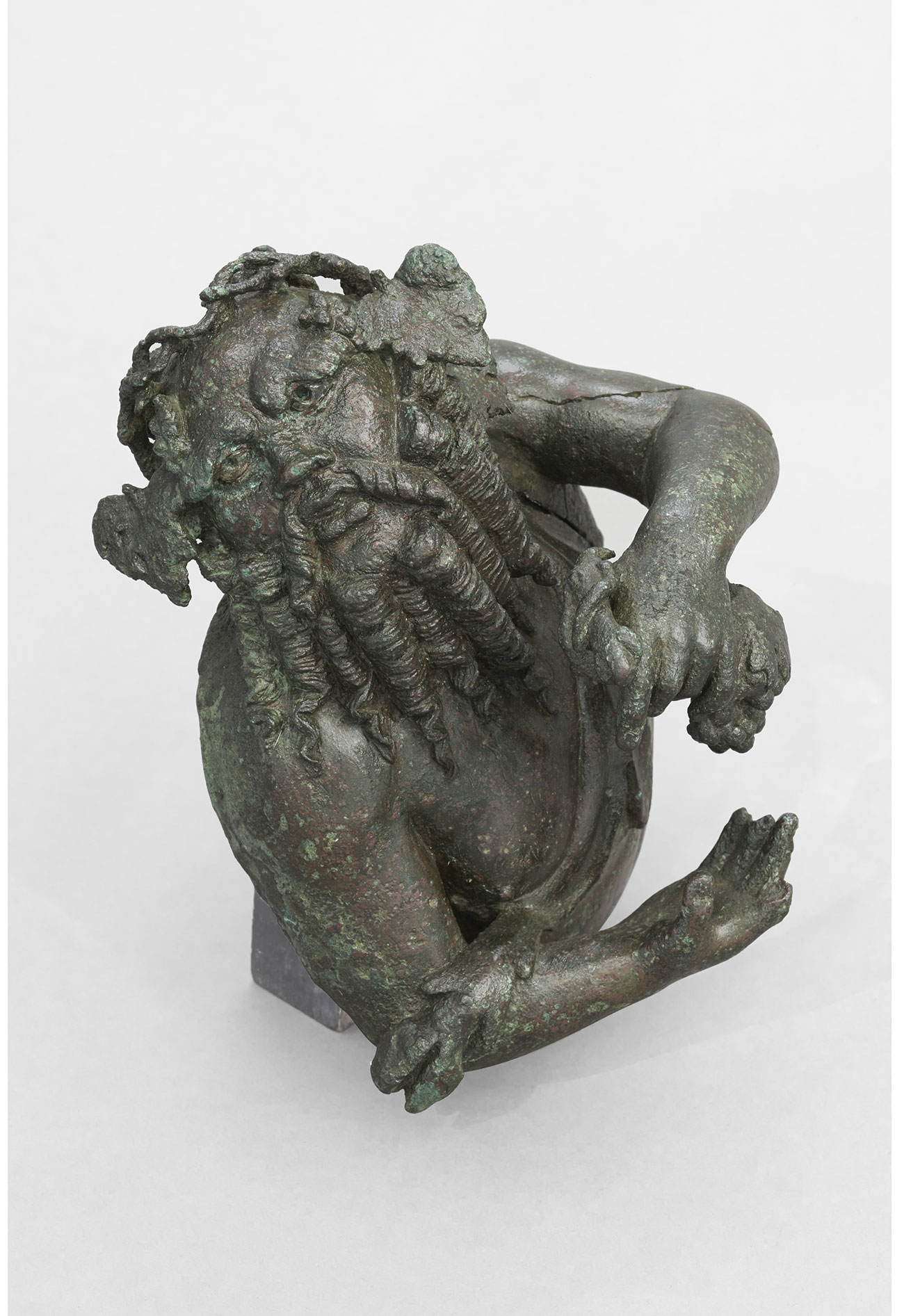 Buste de silène ivre, bronze, Volubilis © Direction du patrimoine culturel, Ministère de la culture du Royaume du Maroc. Photo Mucem, Yves Inchierman