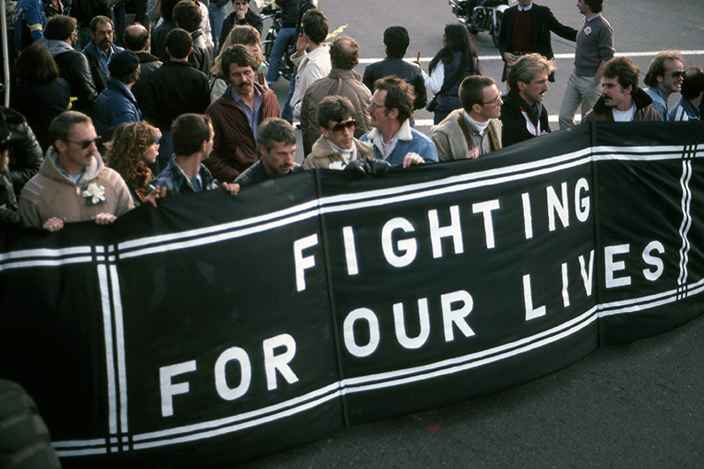 Jean-Baptiste Carhaix, Première manifestation de personnes atteintes par le VIH/sida, San Francisco, au carrefour Castro Street et Market Street, 2 mai 1983 ©Jean-Baptiste Carhaix